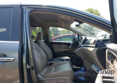 2019 Honda Odyssey Elite z USA, uszkodzony, nr VIN 5FNRL6H97KB094676